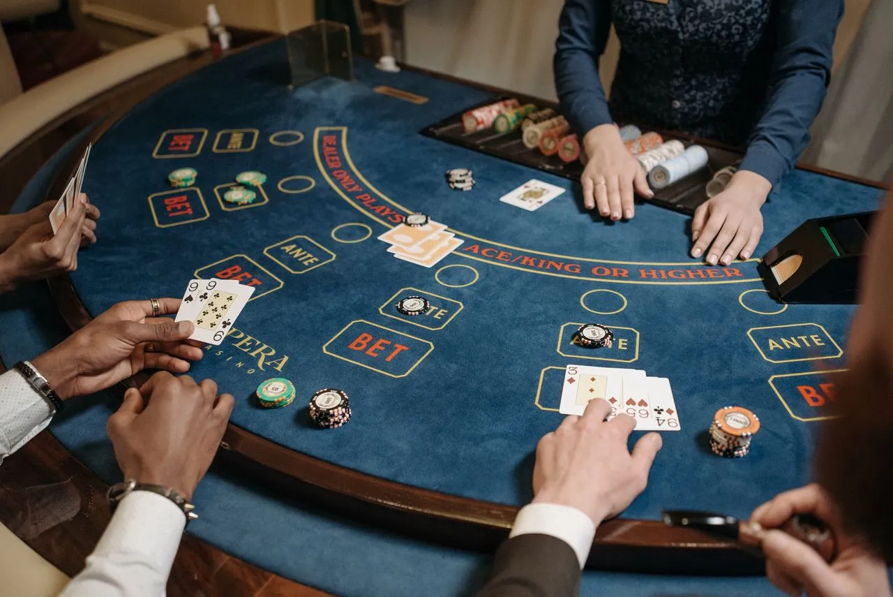 Illuminated gaming tables and entertainment interior